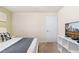 Bedroom with a queen bed, TV, and ample floor space at 8906 Zurich Ln, Kissimmee, FL 34747