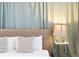 Close-up of a bedroom with a plush bed and calming decor at 8906 Zurich Ln, Kissimmee, FL 34747