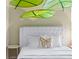 Bright bedroom with a comfortable queen-size bed and decorative pillows at 8906 Zurich Ln, Kissimmee, FL 34747