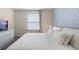 King-size bed with modern decor at 8906 Zurich Ln, Kissimmee, FL 34747