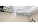 Well-organized closet with wire shelving and ample hanging space at 8906 Zurich Ln, Kissimmee, FL 34747