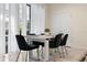 Bright dining room with table and chairs at 8906 Zurich Ln, Kissimmee, FL 34747