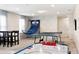 Fun game room, perfect for Gathering entertainment, with ping pong, air hockey and basketball game at 8906 Zurich Ln, Kissimmee, FL 34747