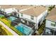 Screened-in rectangular pool with spa at 8906 Zurich Ln, Kissimmee, FL 34747