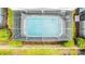Screened-in rectangular pool with spa at 8906 Zurich Ln, Kissimmee, FL 34747
