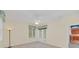 Bedroom with double doors leading outside and ceiling fan at 926 Palm Oak Dr, Apopka, FL 32712