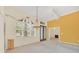 Bright dining room with decorative wall art and large window at 926 Palm Oak Dr, Apopka, FL 32712