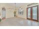 Bright dining room with decorative wall art and large window at 926 Palm Oak Dr, Apopka, FL 32712
