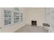 Bright home office with built-in shelving and large window at 926 Palm Oak Dr, Apopka, FL 32712