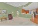 Living room features a view of the kitchen and access to other rooms at 926 Palm Oak Dr, Apopka, FL 32712