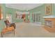 Spacious living room with fireplace, and view of pool and kitchen at 926 Palm Oak Dr, Apopka, FL 32712