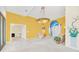 Spacious living room with high ceilings and yellow walls at 926 Palm Oak Dr, Apopka, FL 32712
