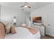 Spacious bedroom with a comfortable bed and plenty of light at 1046 Splash Shot Pl, Davenport, FL 33896