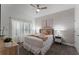 Cozy bedroom with neutral decor and window coverings at 1046 Splash Shot Pl, Davenport, FL 33896