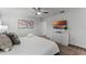 Comfortable bedroom with a queen-size bed and en-suite bathroom at 1046 Splash Shot Pl, Davenport, FL 33896