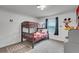 ' bedroom with bunk beds and Mickey Mouse decor at 1046 Splash Shot Pl, Davenport, FL 33896
