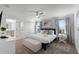 Spacious bedroom with king-size bed and en-suite bathroom at 1046 Splash Shot Pl, Davenport, FL 33896