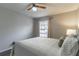 Spacious bedroom featuring a queen-size bed and window at 1057 S Hiawassee Rd # 1911, Orlando, FL 32835