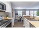 Updated kitchen with breakfast nook and stylish light fixture at 1057 S Hiawassee Rd # 1911, Orlando, FL 32835