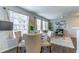 Bright living space with hardwood floors, a white sofa, and a cozy rug creates an inviting atmosphere at 1057 S Hiawassee Rd # 1911, Orlando, FL 32835