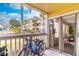 Screened patio with bicycles and view of community at 1057 S Hiawassee Rd # 1911, Orlando, FL 32835
