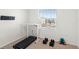 Home gym with treadmill, desk and weights at 1348 Isleta Loop, Kissimmee, FL 34741