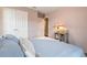 Bedroom featuring large windows, comfortable bed, and soft decor at 1416 Cabot Dr, Clermont, FL 34711