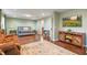 Open main bedroom with en-suite bathroom and comfortable seating area at 1416 Cabot Dr, Clermont, FL 34711