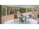 Relaxing back porch with patio furniture and wooded views at 15941 Sw 8Th Pl, Ocala, FL 34481
