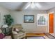 Living room with hardwood floors and recliner chair at 15941 Sw 8Th Pl, Ocala, FL 34481