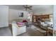 Spacious living room with a fireplace and comfy seating at 15941 Sw 8Th Pl, Ocala, FL 34481