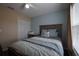 Bedroom with double bed, wood flooring, and closet at 16307 Old Ash Loop, Orlando, FL 32828