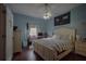 Spacious bedroom with wood flooring and a large bed at 16307 Old Ash Loop, Orlando, FL 32828