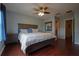 Bright bedroom featuring wood flooring and a double bed at 16307 Old Ash Loop, Orlando, FL 32828