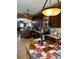 Open kitchen with island and stainless steel appliances at 16307 Old Ash Loop, Orlando, FL 32828
