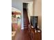 Hardwood staircase and view into living area at 16307 Old Ash Loop, Orlando, FL 32828