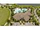 Community center building with adjacent pool and parking at 16626 Point Rock Dr, Winter Garden, FL 34787