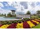 Waterleigh community entrance with a beautiful fountain and landscaping at 16626 Point Rock Dr, Winter Garden, FL 34787