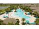 Aerial view of a community pool and surrounding patio area at 16626 Point Rock Dr, Winter Garden, FL 34787