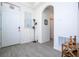 Front entryway with tile floors and view to living room at 16626 Point Rock Dr, Winter Garden, FL 34787