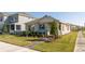 Craftsman style home with a welcoming front porch and nicely manicured lawn at 16626 Point Rock Dr, Winter Garden, FL 34787