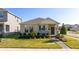 One-story home with stone accents, landscaping, and a brick walkway at 16626 Point Rock Dr, Winter Garden, FL 34787