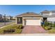 House exterior showing garage and screened patio at 16626 Point Rock Dr, Winter Garden, FL 34787