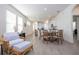Open concept living room with view of kitchen and dining area at 16626 Point Rock Dr, Winter Garden, FL 34787