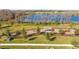 Community playground with play structures near a lake at 16626 Point Rock Dr, Winter Garden, FL 34787