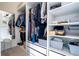 Spacious walk-in closet with ample shelving and hanging space at 16626 Point Rock Dr, Winter Garden, FL 34787