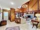 Inviting entryway with wood-paneled walls and a view into the living area at 17952 Lookout Hill Rd, Winter Garden, FL 34787