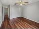 Simple bedroom with wood floors and a large closet at 1878 Algonquin Ave, Deltona, FL 32725