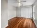 Simple bedroom featuring hardwood floors and ceiling fan at 1878 Algonquin Ave, Deltona, FL 32725