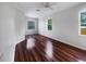 Bright bedroom with hardwood floors and ample natural light at 1878 Algonquin Ave, Deltona, FL 32725